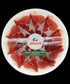 Den virkelige emballage til Altanza Cebo de Campo 50% Ibérico skinke på tallerken, 80 g, maskinskåret med knivskåret effekt.
